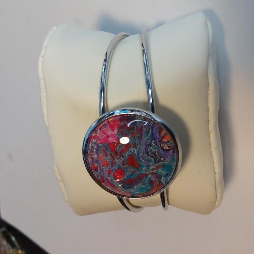 Silver cuff bracelet w/design by Ms Mels Creations w/colors purple, red, orange